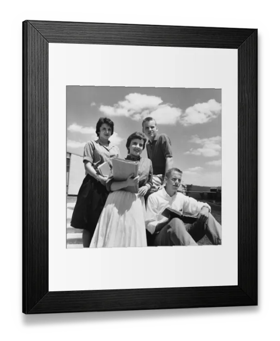 Framed Print : Four students on steps, posing Framed Print : Four students on steps, posing