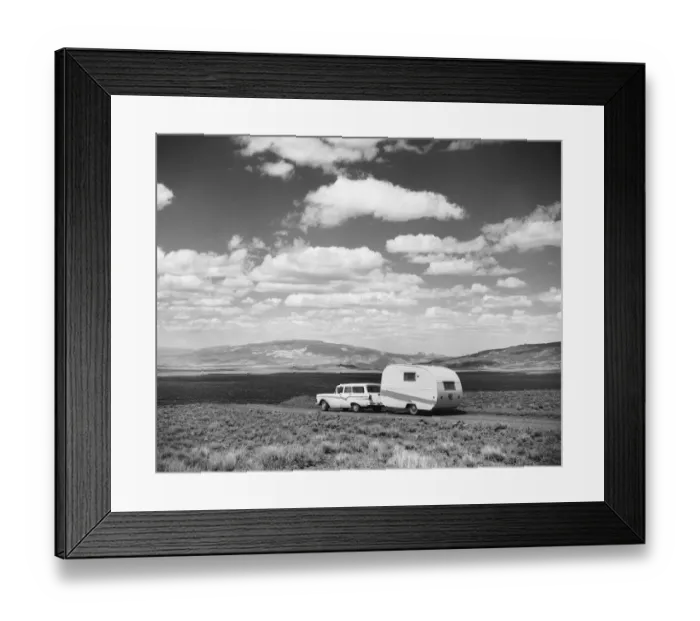 Framed Print : Car pulling trailer on road Framed Print : Car pulling trailer on road