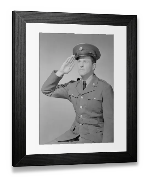 Framed Print : Young man in uniform saluting Framed Print : Young man in uniform saluting