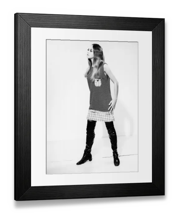 Framed Print : Young woman in dress, studio shot Framed Print : Young woman in dress, studio shot