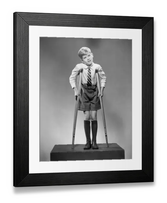 Framed Print : Boy on crutches, portrait Framed Print : Boy on crutches, portrait