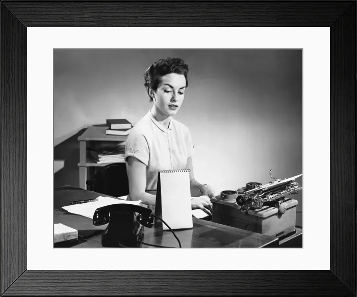 Framed Print : Woman typing Framed Print : Woman typing