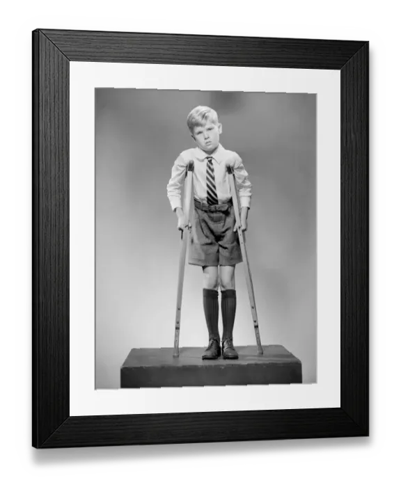 Framed Print : Boy on crutches, portrait Framed Print : Boy on crutches, portrait