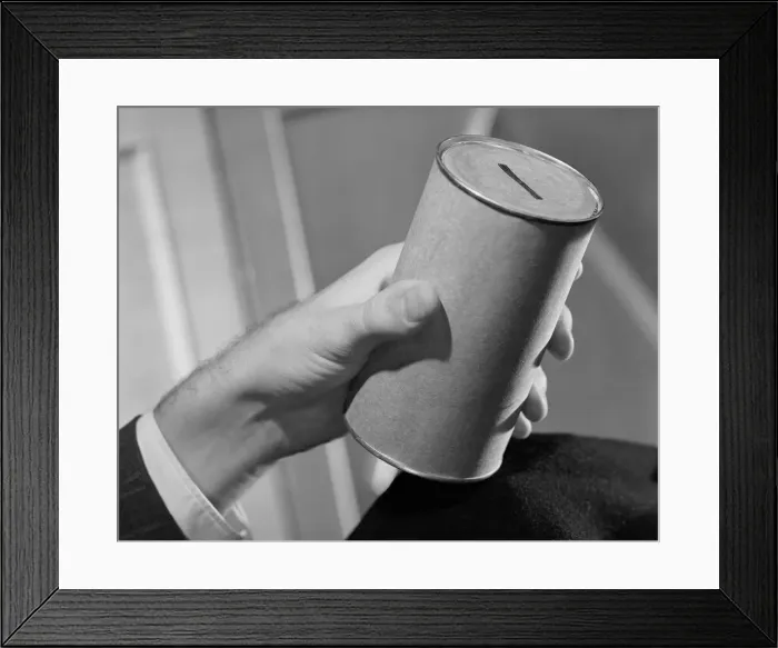 Framed Print : Man holding collection jar Framed Print : Man holding collection jar