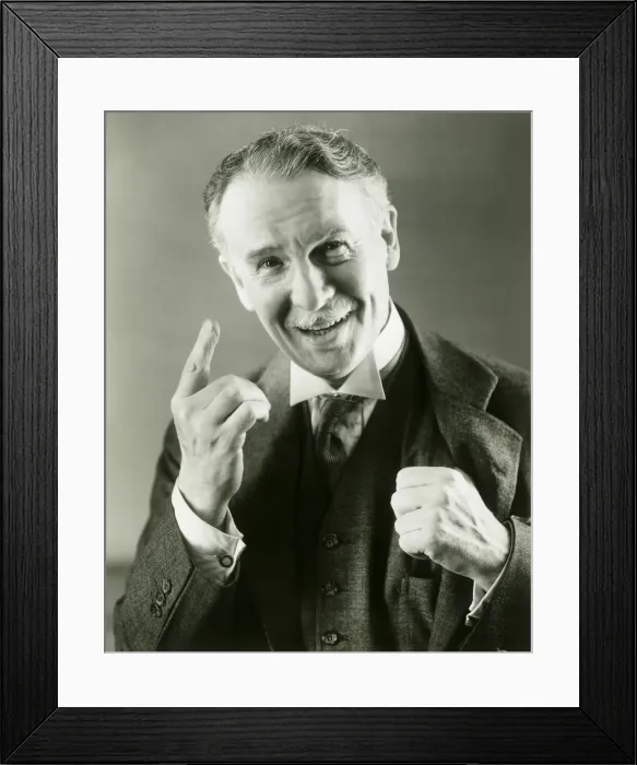Framed Print : Senior man gesturing, portrait