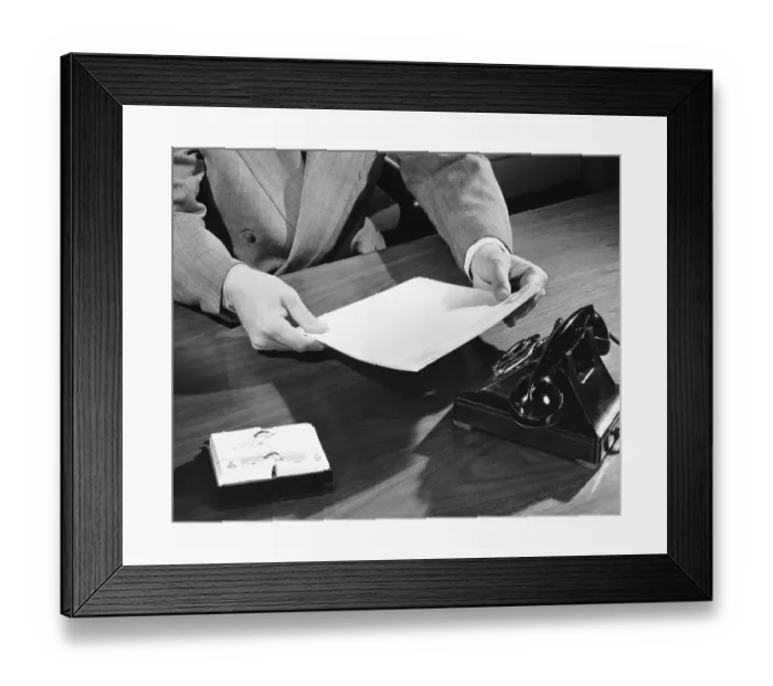 Framed Print : Hand shot of man holding document Framed Print : Hand shot of man holding document