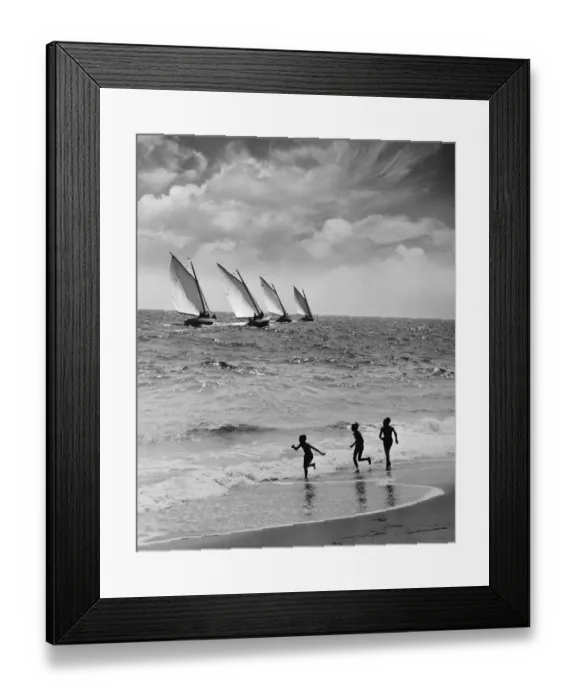 Framed Print : Three boys running along beach, following four sailboats out on ocean Framed Print : Three boys running along beach, following four sailboats out on ocean