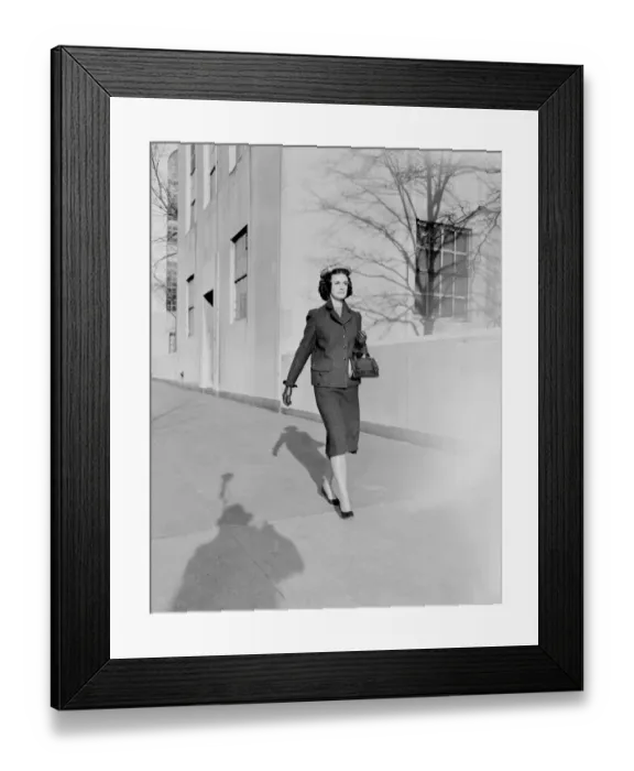 Framed Print : Woman walking down street Framed Print : Woman walking down street