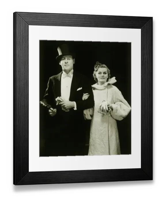 Framed Print : Couple in evening wear outdoors, portrait Framed Print : Couple in evening wear outdoors, portrait