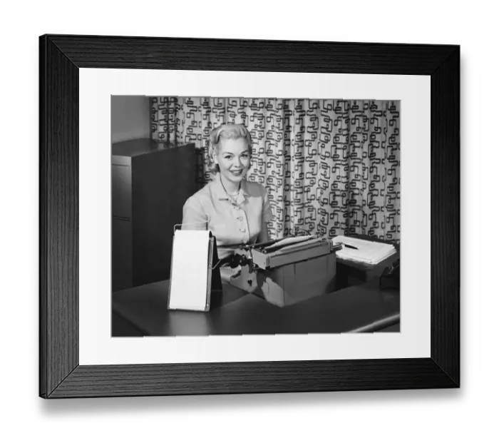 Framed Print : Woman typing, smiling and posing