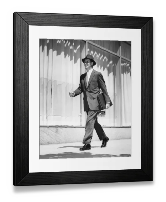 Framed Print : Man walking on street Framed Print : Man walking on street