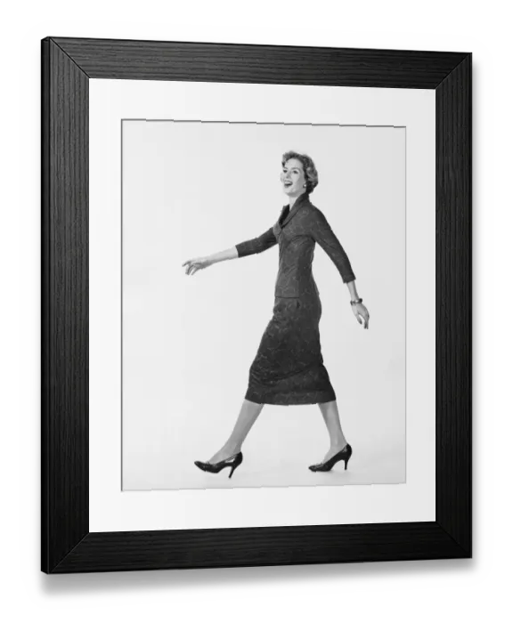 Framed Print : Woman walking and smiling Framed Print : Woman walking and smiling