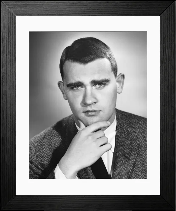 Framed Print : Man rubbing chin Framed Print : Man rubbing chin