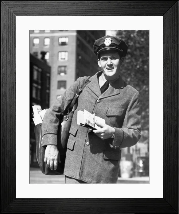 Framed Print : Postman in street, portrait Framed Print : Postman in street, portrait