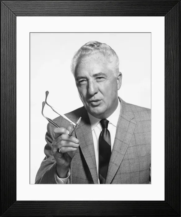 Framed Print : Man talking, holding glasses Framed Print : Man talking, holding glasses