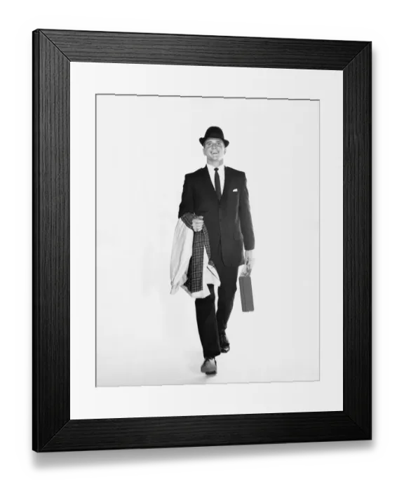 Framed Print : Man walking, carrying briefcase and jacket Framed Print : Man walking, carrying briefcase and jacket