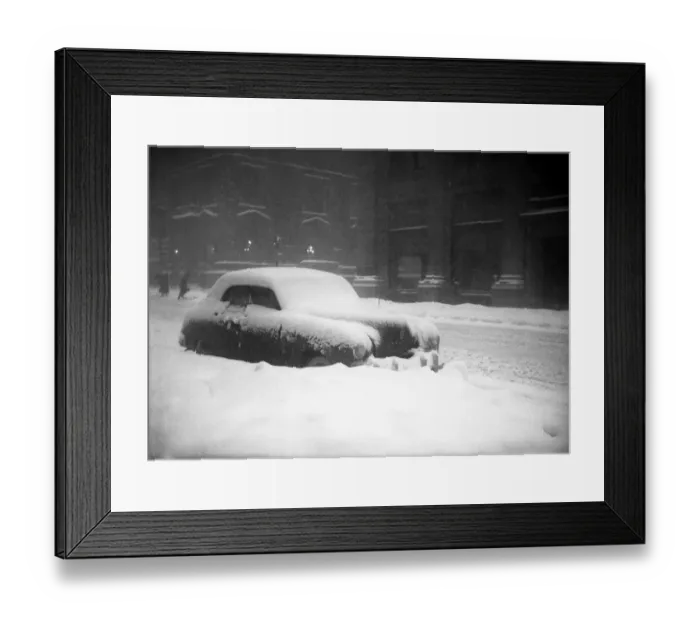 Framed Print : Snow capped car on street in blizzard, (B&W) Framed Print : Snow capped car on street in blizzard, (B&W)