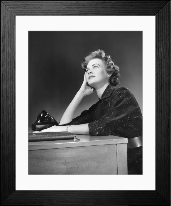 Framed Print : Woman thinking, looking upward Framed Print : Woman thinking, looking upward