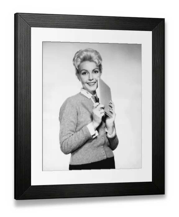 Framed Print : Woman holding pencil and paper