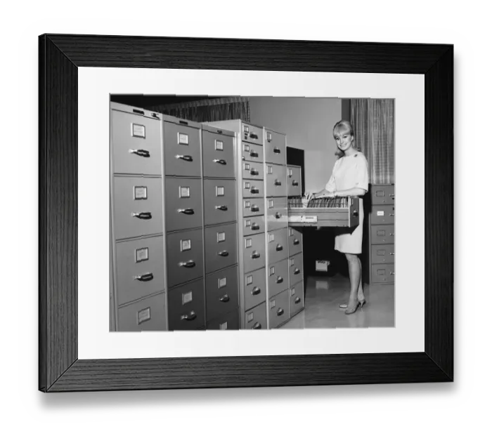 Framed Print : Woman filing Framed Print : Woman filing