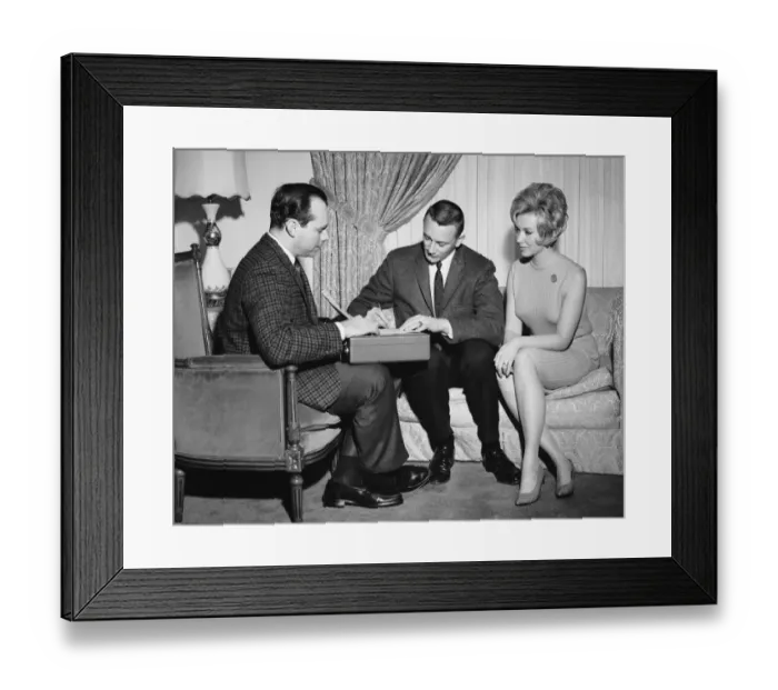 Framed Print : Couple with salesman Framed Print : Couple with salesman