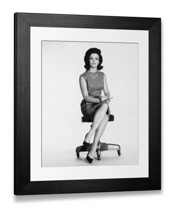 Framed Print : Woman sitting, taking notes Framed Print : Woman sitting, taking notes