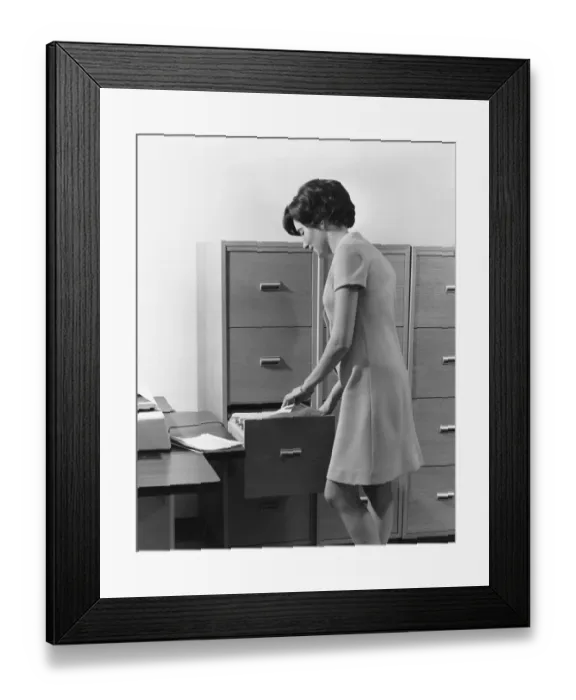 Framed Print : Woman filing Framed Print : Woman filing