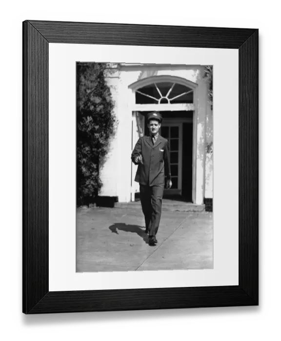 Framed Print : Mailman in front of house, (B&W) Framed Print : Mailman in front of house, (B&W)