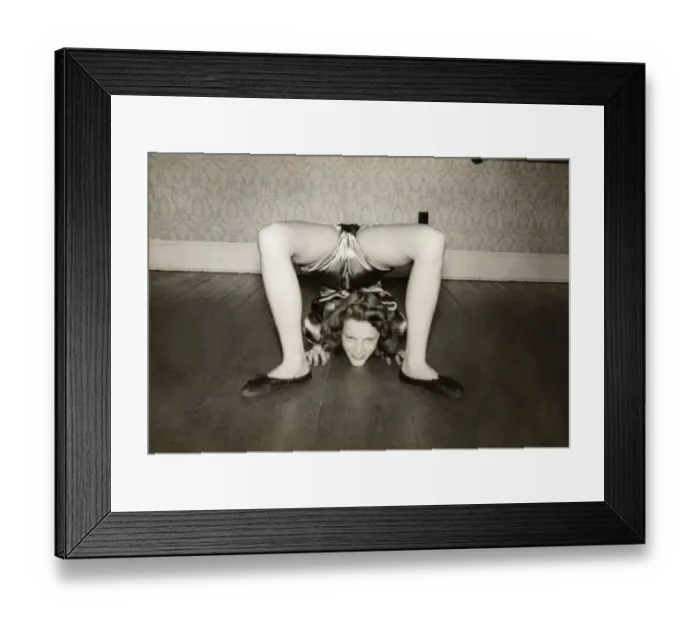 Framed Print : Flexible Woman on the Living Room Floor With Her Legs Over Her Head Framed Print : Flexible Woman on the Living Room Floor With Her Legs Over Her Head
