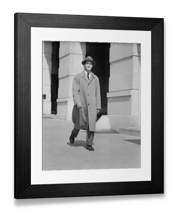 Framed Print : Portrait of man walking along sidewalk Framed Print : Portrait of man walking along sidewalk
