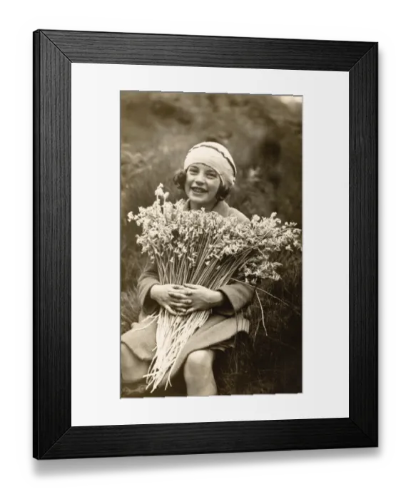 Framed Print : Portrait of a Smiling Girl Holding a Bunch of Flowers Framed Print : Portrait of a Smiling Girl Holding a Bunch of Flowers