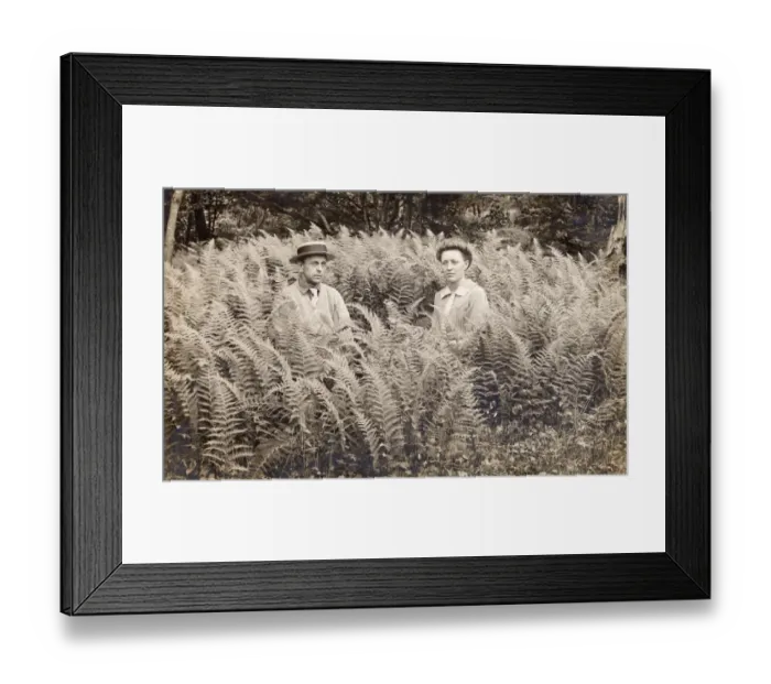 Framed Print : Portrait of a Serious Looking Couple Sitting in Fern Framed Print : Portrait of a Serious Looking Couple Sitting in Fern