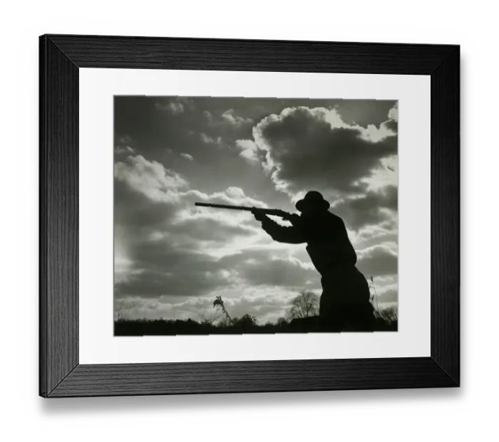 Framed Print : Silhouette of man aiming shotgun outdoors Framed Print : Silhouette of man aiming shotgun outdoors