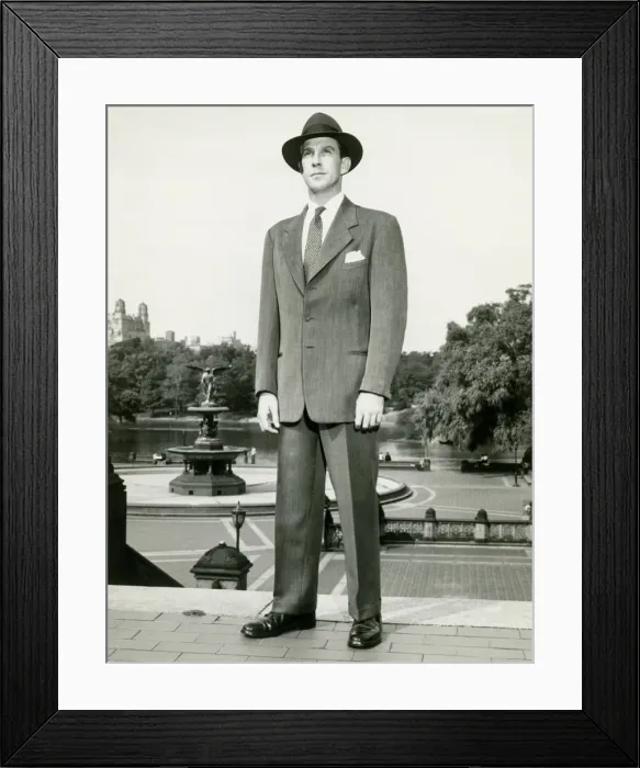 Framed Print : Man in fedora standing on top of steps in park Framed Print : Man in fedora standing on top of steps in park