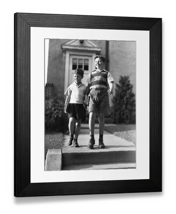Framed Print : Two brothers (6-7, 10-11) on way to school, (B&W) Framed Print : Two brothers (6-7, 10-11) on way to school, (B&W)