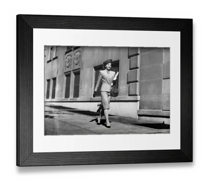 Framed Print : Elegant woman walking on sidewalk, (B&W) Framed Print : Elegant woman walking on sidewalk, (B&W)