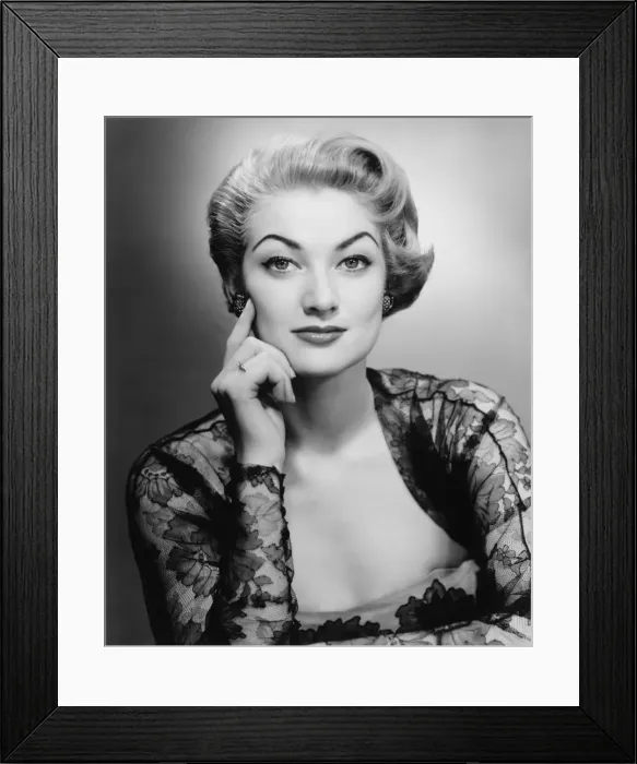 Framed Print : Woman in evening dress posing in studio (B&W), portrait Framed Print : Woman in evening dress posing in studio (B&W), portrait