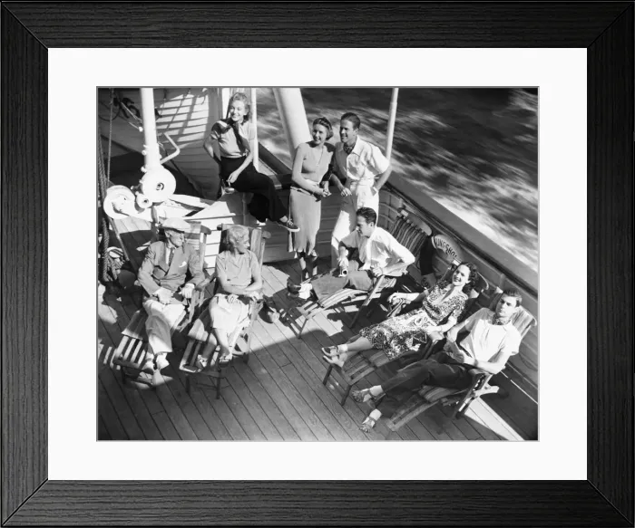 Framed Print : Group of people relaxing on cruiser deck (B&W), elevated view Framed Print : Group of people relaxing on cruiser deck (B&W), elevated view