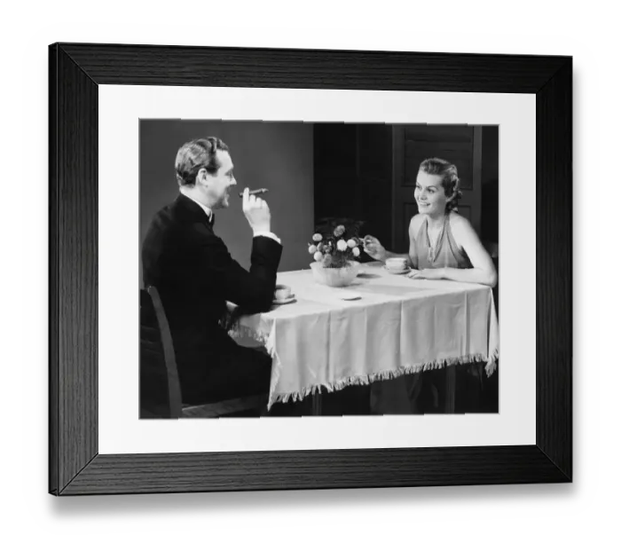 Framed Print : Couple having coffee at table (B&W) Framed Print : Couple having coffee at table (B&W)