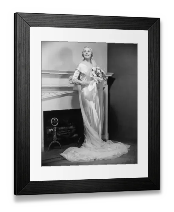 Framed Print : Bride posing at fireplace (B&W), portrait Framed Print : Bride posing at fireplace (B&W), portrait