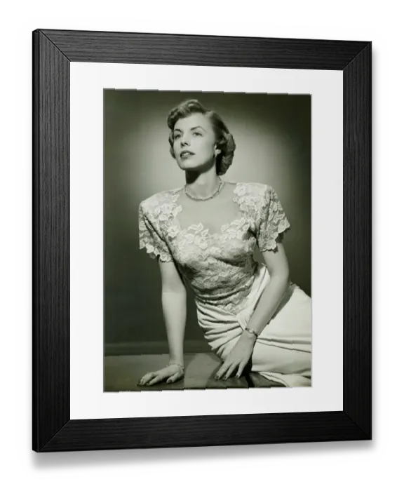 Framed Print : Woman wearing lace evening gown posing in studio, (B&W), (Portrait) Framed Print : Woman wearing lace evening gown posing in studio, (B&W), (Portrait)