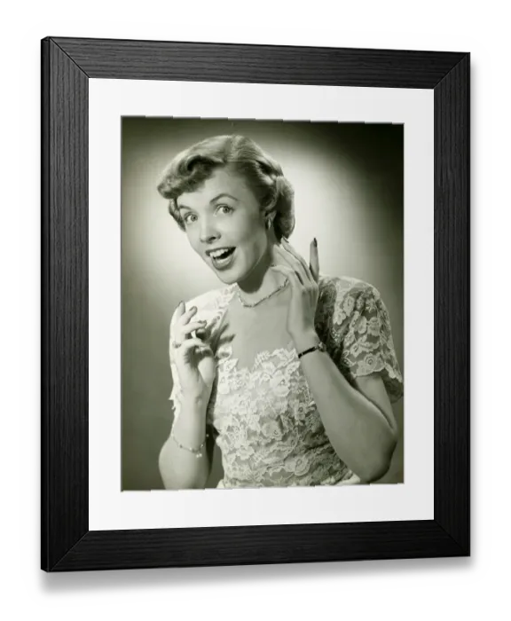 Framed Print : Woman wearing lace dress gesturing in studio, (B&W), (Close-up), (Portrait) Framed Print : Woman wearing lace dress gesturing in studio, (B&W), (Close-up), (Portrait)