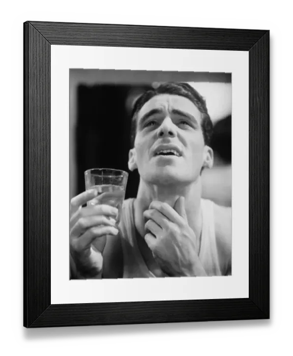 Framed Print : Man gargling, touching throat (B&W) Framed Print : Man gargling, touching throat (B&W)