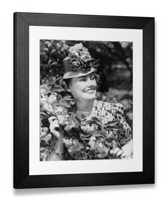Framed Print : Woman posing at blooming bush (B&W) Framed Print : Woman posing at blooming bush (B&W)