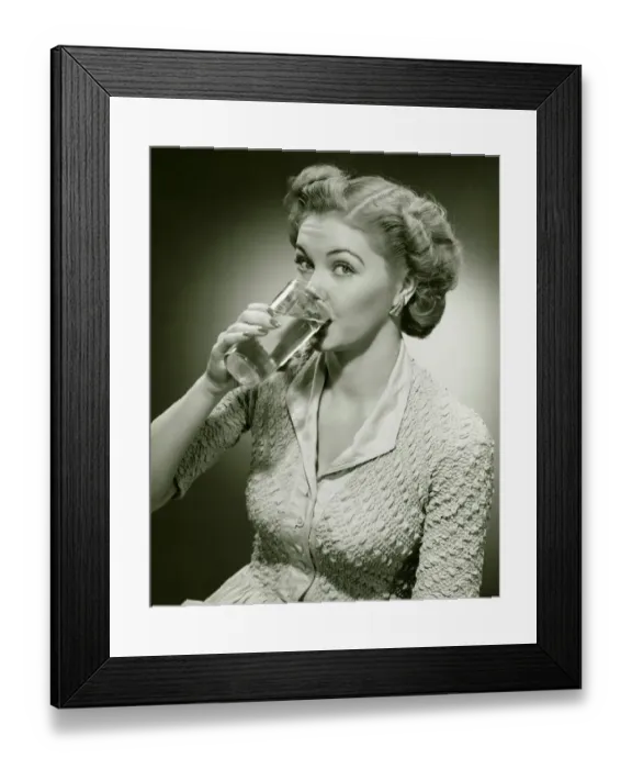 Framed Print : Woman drinking water from tall glass, (B&W), (Close-up), (Portrait) Framed Print : Woman drinking water from tall glass, (B&W), (Close-up), (Portrait)
