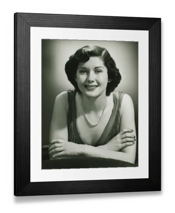 Framed Print : Smiling woman posing in studio, (B&W), (Close-up), (Portrait) Framed Print : Smiling woman posing in studio, (B&W), (Close-up), (Portrait)