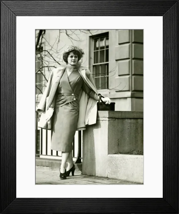 Framed Print : Elegant woman posing on sidewalk, (B&W) Framed Print : Elegant woman posing on sidewalk, (B&W)