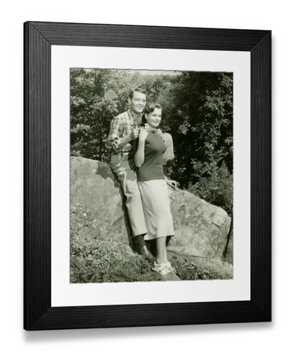Framed Print : Couple sitting on boulder in park, (B&W) Framed Print : Couple sitting on boulder in park, (B&W)