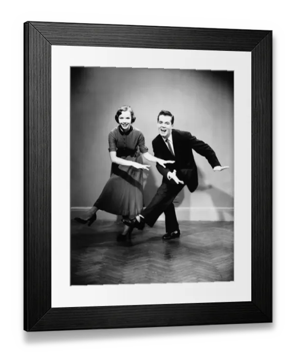 Framed Print : Young couple dancing in empty room, (B&W) Framed Print : Young couple dancing in empty room, (B&W)