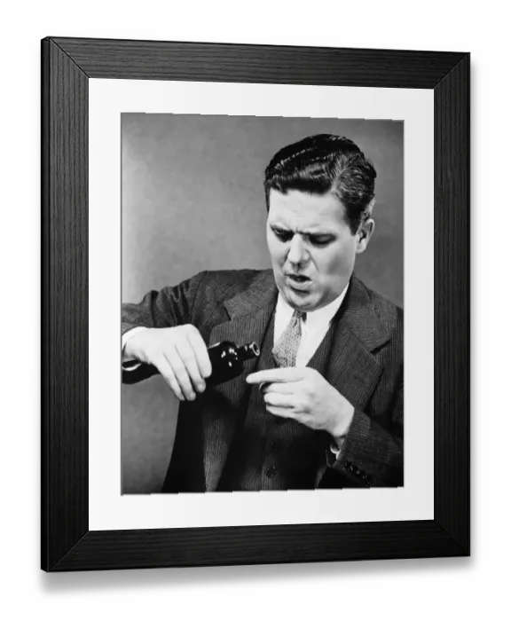Framed Print : Businessman pouring medicine, , (B&W) Framed Print : Businessman pouring medicine, , (B&W)